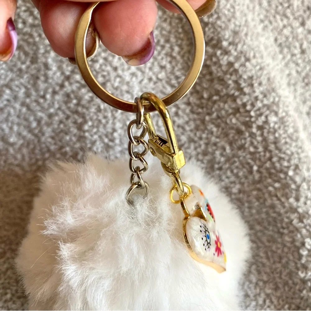 🎅🏻 SALE! White Fuzzy ball with heart charm bag charm Or key chain brand new